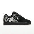 Black sneaker with white floral patterns and DC logo on a white background