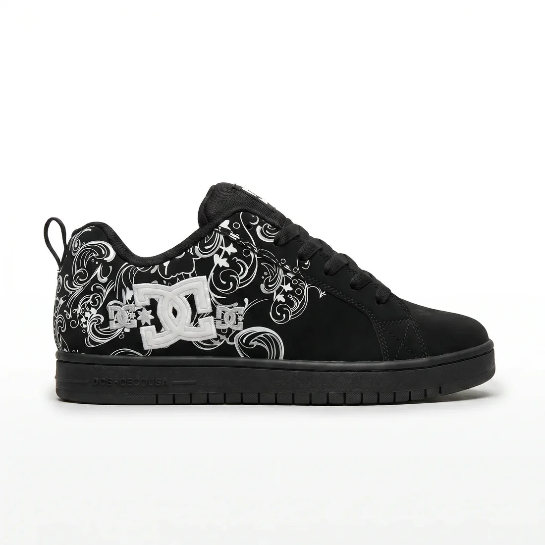 Black sneaker with white floral patterns and DC logo on a white background