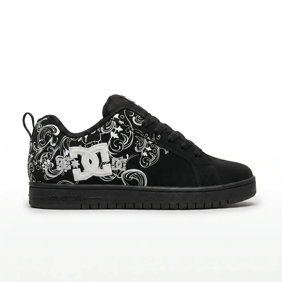 Black sneaker with white floral patterns and DC logo on a white background